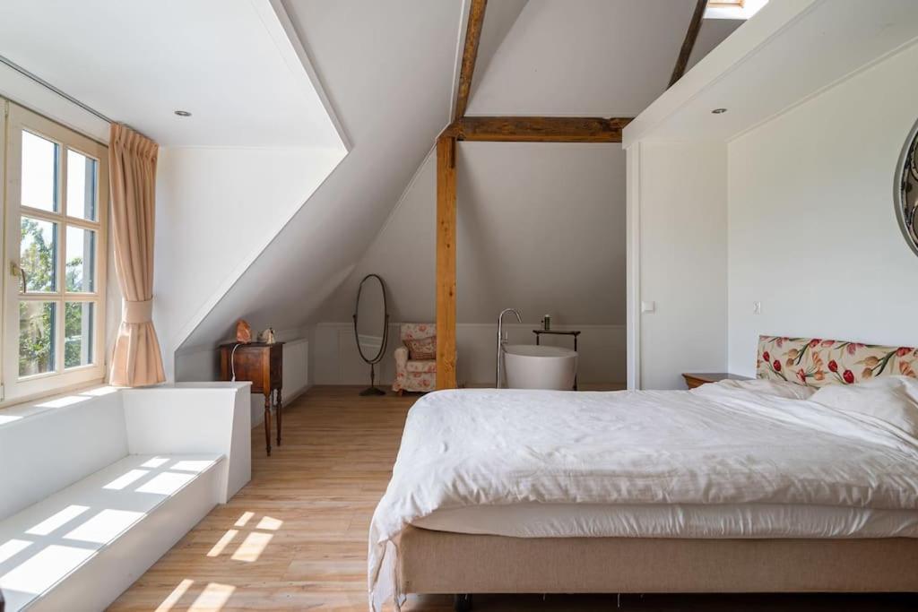 De Twee Zwanen Villa Delfstrahuizen ภายนอก รูปภาพ